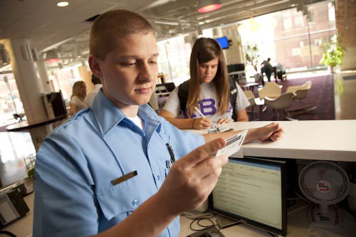 Campus Security Officer Checking ID 