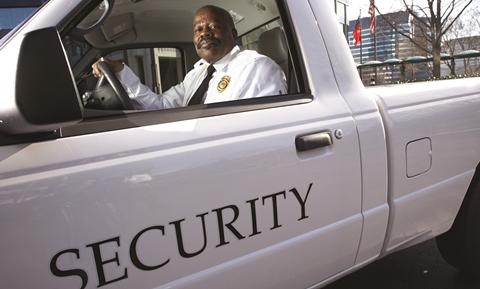 security professional in vehicle