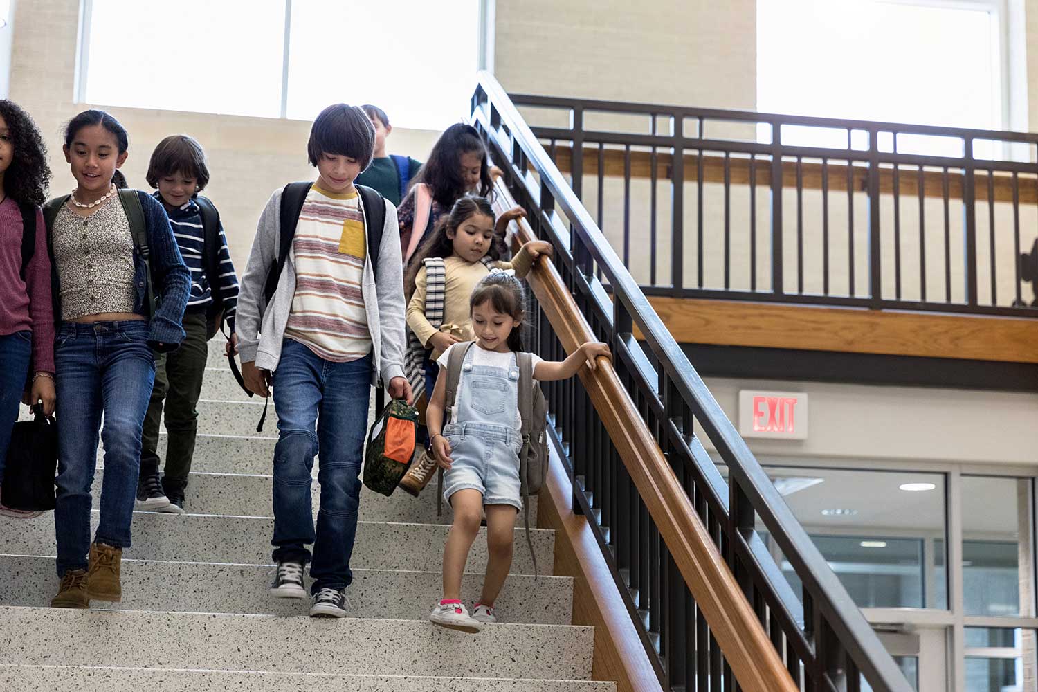 School children walking down stairs