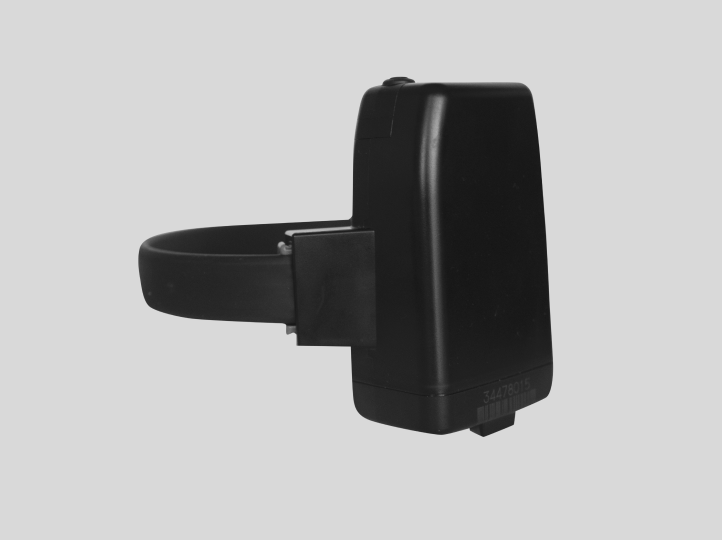 Shows a side view of a black GPS tracking device 
