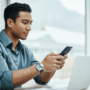 a man looking at his mobile phone