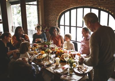 Family eating thanksgiving dinner together