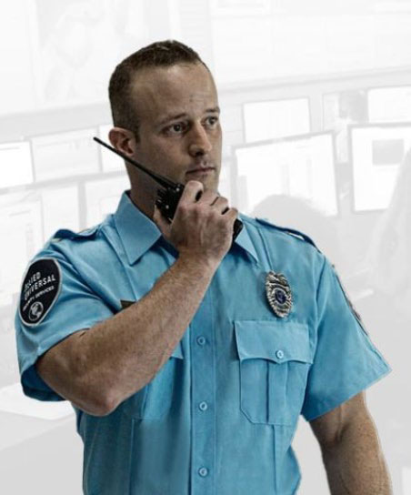 Security officer holding a walkie talkie