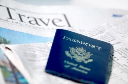 travel newspaper and passport