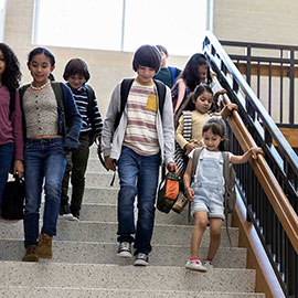 students walking down stairs