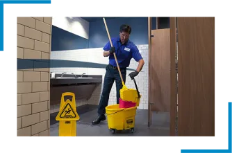 Man cleaning the restroom