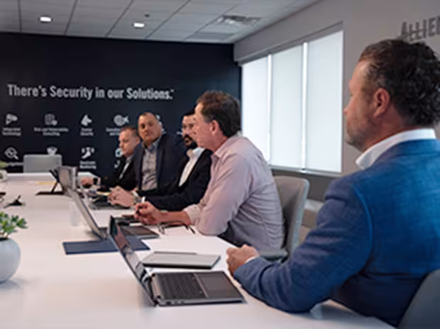 people gathered around a conference table
