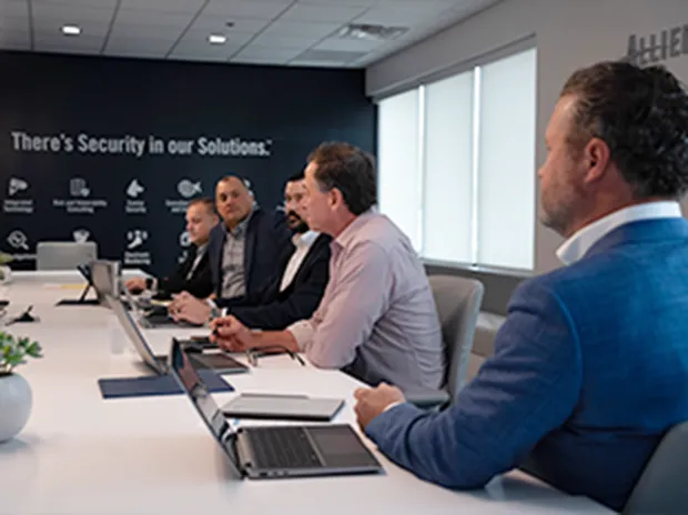 people gathered around a conference table