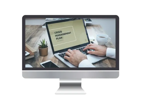 Image of a desktop and in the screen it's written crisis management plans