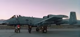A military jet on the runway  