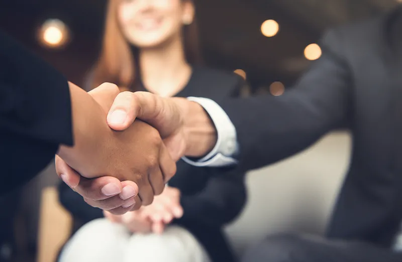 two people shaking hand