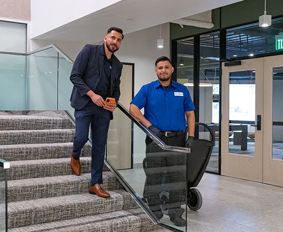 Men on stairs, janitorial services