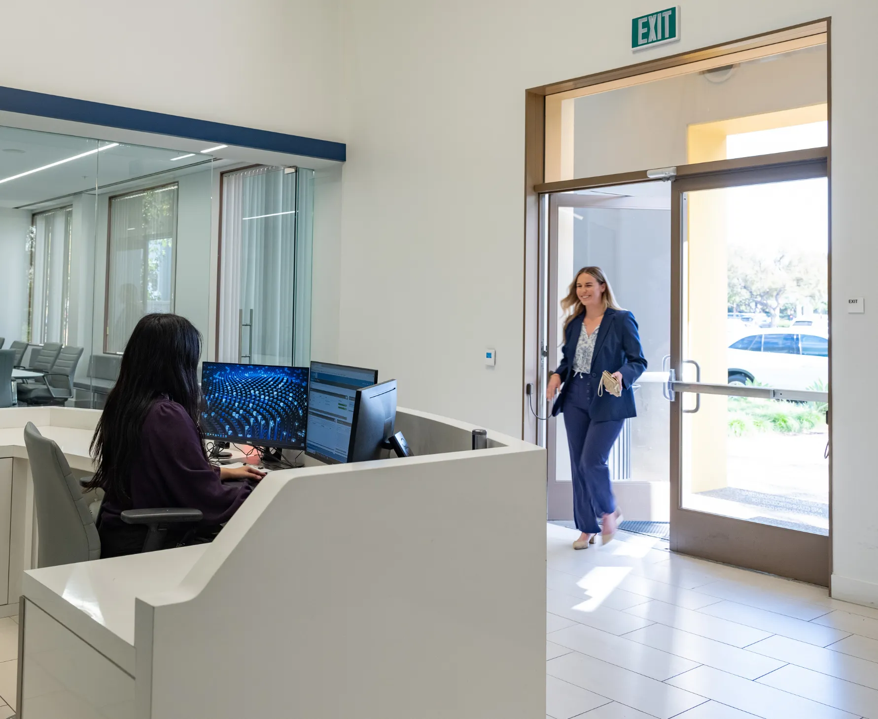 women walking into the building